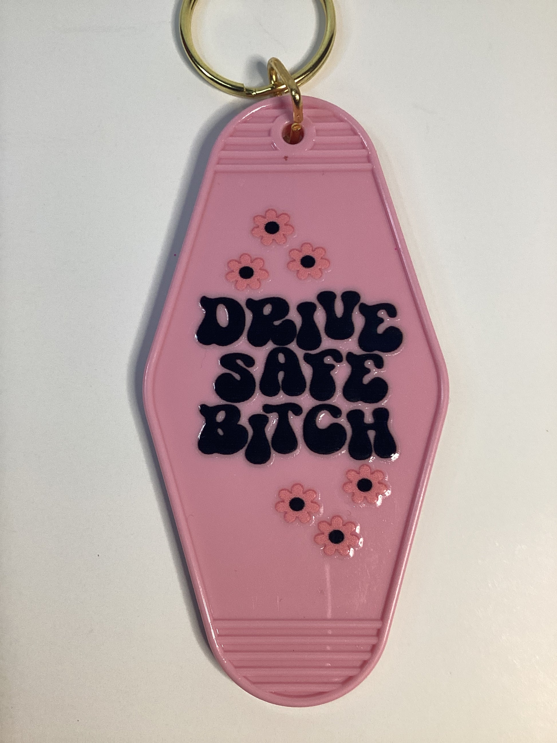 Drive Safe B Motel Style Keychain 